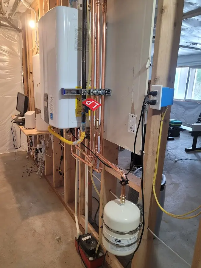 Licensed plumber repairing a kitchen sink in Waihee-Waiehu